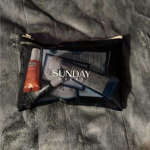 Sunday Riley Skincare Collection in Black Mesh Pouch